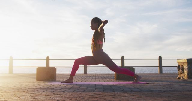 Woman Practicing Yoga Pose Outdoors at Sunrise in Coastal Environment - Download Free Stock Images Pikwizard.com