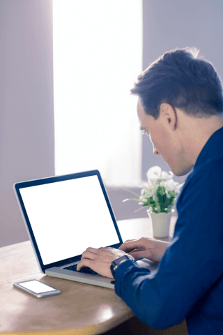 Businessman Working on Laptop with Transparent Screen in Office - Download Free Stock Videos Pikwizard.com