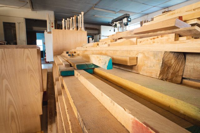 Interior of Workshop with Stack of Various Planks - Download Free Stock Images Pikwizard.com