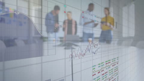 Business Team Analyzing Data with Virtual Charts Overlay