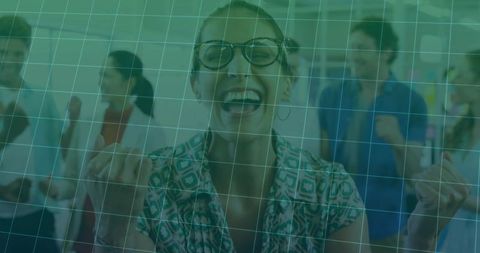 Team Celebrating Success with Excitement in Modern Office