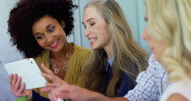 Diverse Women Sharing Ideas on Digital Tablet - Download Free Stock Images Pikwizard.com