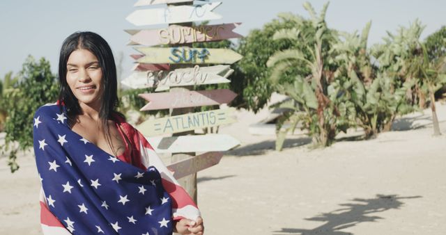 Smiling Woman Posing with American Flag at Beach Resort - Download Free Stock Images Pikwizard.com