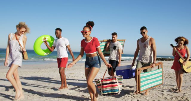 Group of Friends Enjoying a Day at the Beach - Download Free Stock Images Pikwizard.com