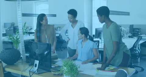 Diverse Team Engaging in Office Meeting with Digital Overlay