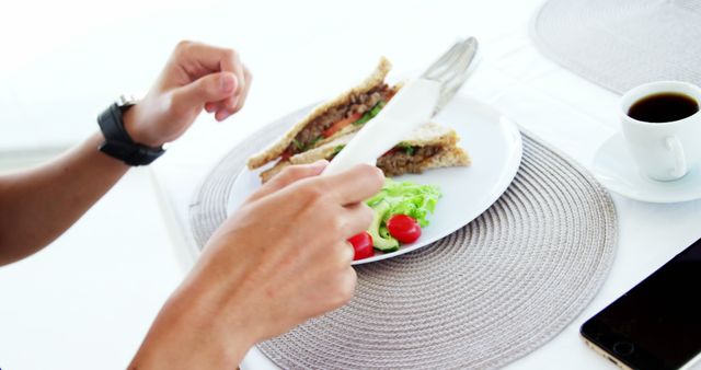 Person Eating Healthy Sandwich with Fresh Vegetables and Coffee - Download Free Stock Images Pikwizard.com