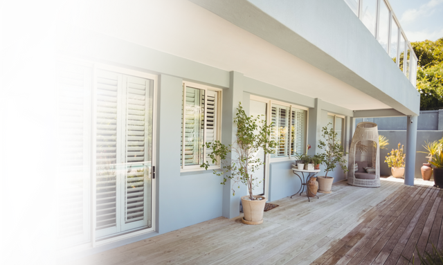 Transparent Patio Balcony with ShutteredWindows and Plant Decor - Download Free Stock Videos Pikwizard.com