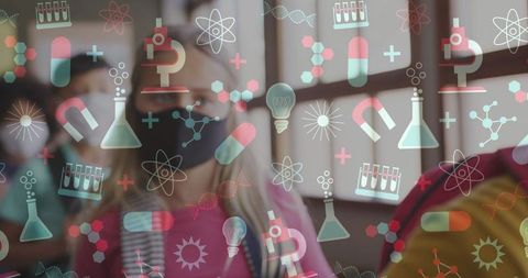 Children Wearing Masks in Classroom with Education Icon Overlay