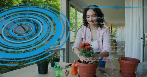 Woman repotting flowering plant on balcony with ar gardening overlay