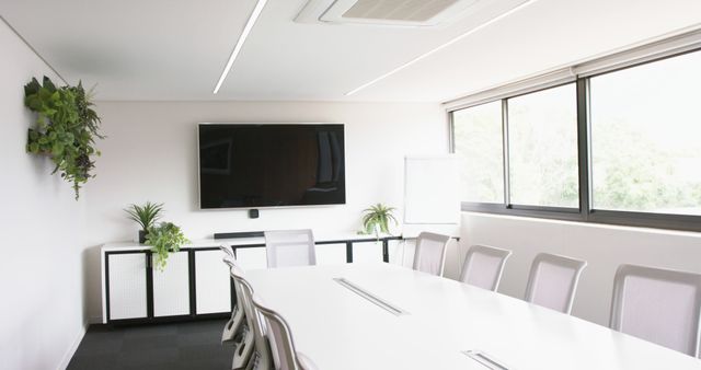 Modern Conference Room with Large Television and Glass Windows - Download Free Stock Images Pikwizard.com