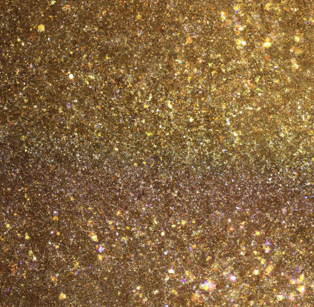 Use this close-up of sparkling gold glitter for backgrounds in festive designs, invitations, party decorations, or luxury branding. Perfect for adding a touch of elegance and celebration to various projects.