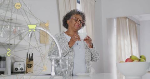 Technology and Connection with Senior Enjoying Coffee