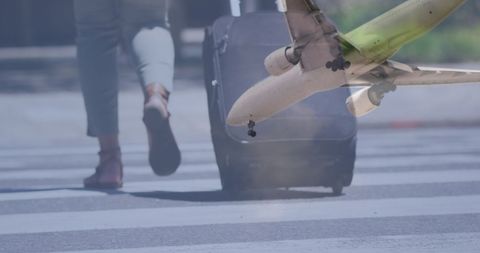 Airplane Overlapping Traveler Walking with Suitcase on Crosswalk - Download Free Stock Images Pikwizard.com