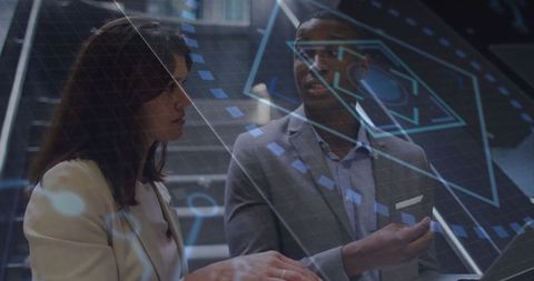 Business Team Collaborating with Futuristic Holographic Interface