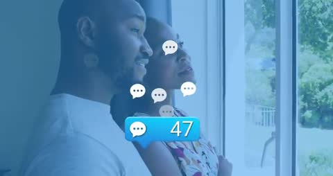 Smiling Couple Observing Virtual Instant Messaging Progress