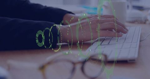 Professional Typist Using Keyboard on Modern Office Desk with Futuristic Graphics