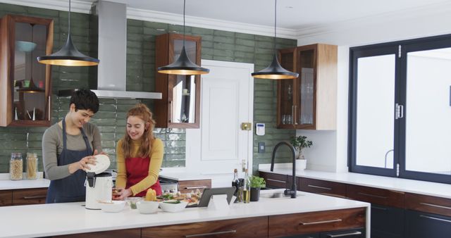 Two Women Preparing Healthy Breakfast in Modern Kitchen - Download Free Stock Images Pikwizard.com