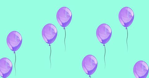 Purple Balloons on Green Background Celebrating Festivity