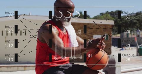 Mature athlete checking smartphone holding basketball on coastal court with hud interface