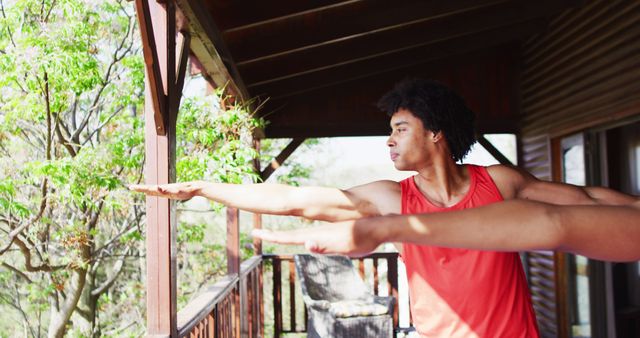 Two Young Men Practicing Yoga on Outdoor Deck - Download Free Stock Images Pikwizard.com