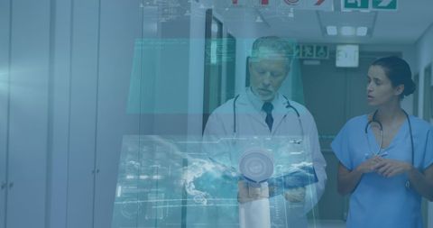 Medical professionals analyzing data on digital displays
