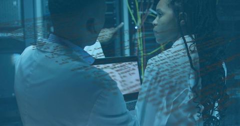 Technicians Analyzing Server Infrastructure in Data Center