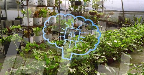 AI greenhouse monitoring overlaying neural chip graphic on lush potted plant nursery system