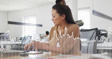 Businesswoman integrating technology in modern office setting