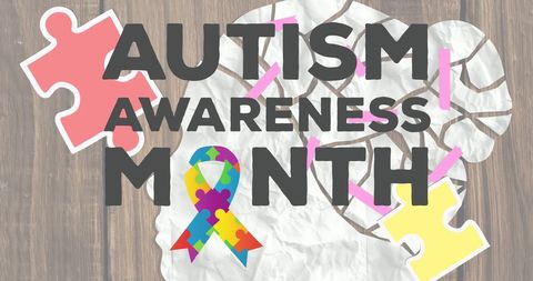 Autism awareness month text with puzzle ribbon and silhouette