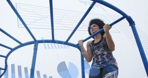 African American Woman Exercising Under Digital Data Overlay