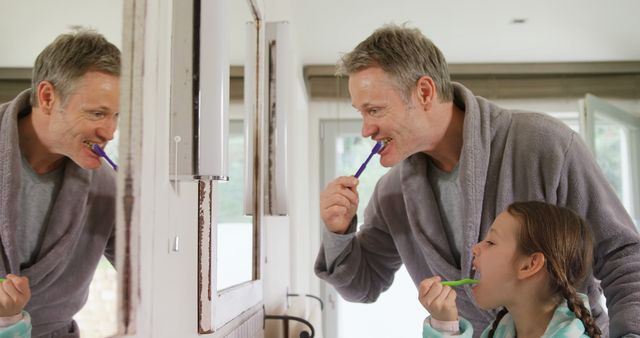 Father and Daughter Brushing Teeth in Bright Bathroom for Morning Routine - Download Free Stock Images Pikwizard.com