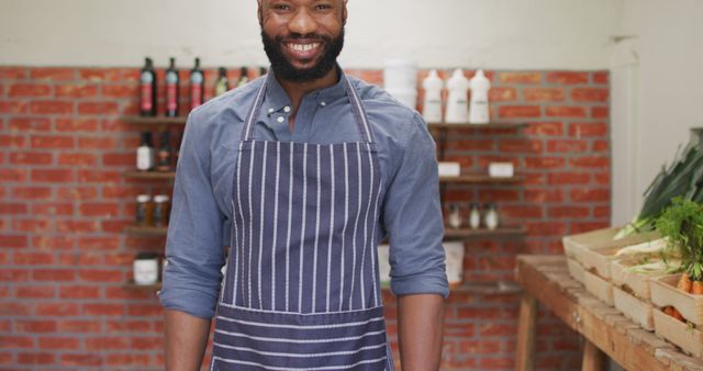 Smiling Artisan in Apron Inside Organic Market - Download Free Stock Images Pikwizard.com