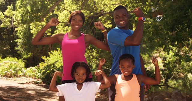 Happy Family Flexing Muscles Outdoors in Summer - Download Free Stock Images Pikwizard.com