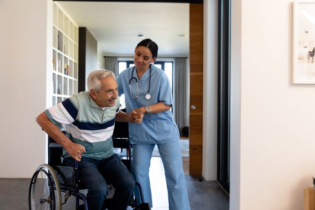 Female doctor assisting senior man in getting up from wheelchair at home. Ideal for use in healthcare, elderly care, physical therapy, and medical support contexts. Useful for illustrating patient care, home healthcare services, and recovery processes.