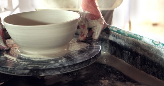 Hands Shaping Clay Bowl on Pottery Wheel - Download Free Stock Images Pikwizard.com