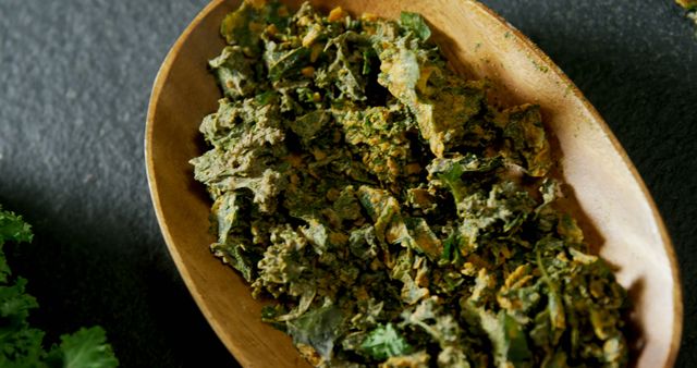 Close-up of Homemade Kale Chips in Wooden Bowl - Download Free Stock Images Pikwizard.com