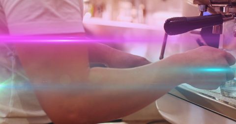Barista carefully preparing espresso with precision