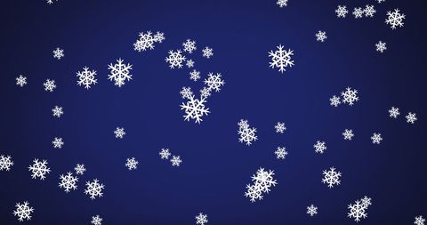 White Snowflakes Falling Against Dark Blue Background
