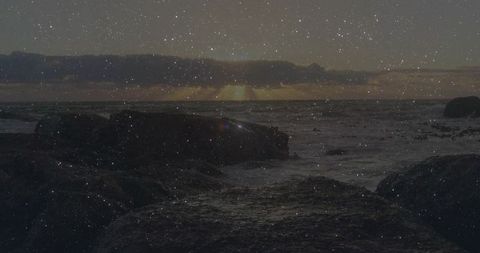 Golden Sunset Over Rugged Ocean Coastline with Powerful Waves