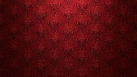 Burgundy embossed fan-pattern wallpaper evoking vintage theater glamour and luxury interior
