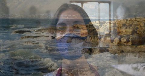 Contemplative Woman Wearing Mask Overlooking Scenic Rocky Shoreline