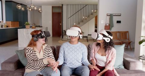 Diverse friends enjoying virtual reality friendship experience