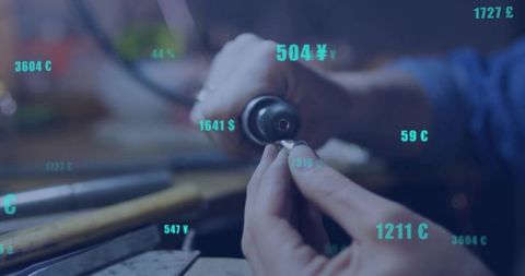 Artisan shaping metal ring with rotary tool on workbench with teal price overlays