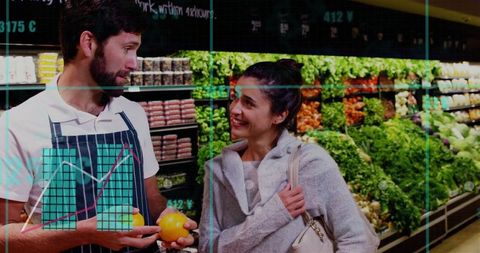 Grocery Employee Assisting Smiling Customer Choosing Fresh Produce