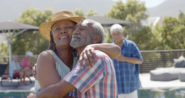 Happy Senior Couple Hugging Outdoors Near Poolside - Download Free Stock Images Pikwizard.com