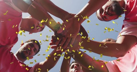 Celebration Moment: Football Team Unity with Confetti - Download Free Stock Images Pikwizard.com