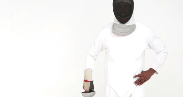 Male Fencer Wearing Protective Gear and Holding Sabre Against White Background - Download Free Stock Images Pikwizard.com