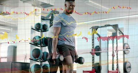 Athlete performing dumbbell lunge in modern gym with stock market data overlay