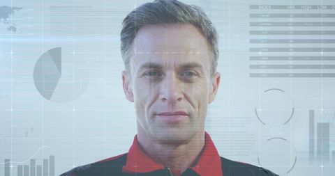 Businessman analyzing virtual financial graphs and data overlay