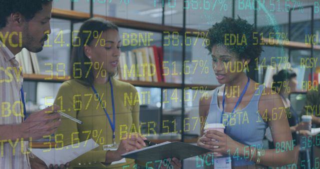 Diverse Team Discussing Financial Data with Holographic Display - Download Free Stock Images Pikwizard.com